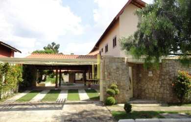 Imagem: A casa em condomínio possui 4 Dormitórios, 5 Banheiros, 4