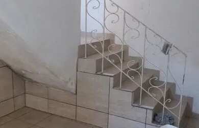 Imagem: A casa possui 2 Dormitórios, 2 Banheiros e está localizado