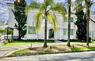 Imagem: A casa em condomínio possui 5 Dormitórios, 5 Banheiros, 5