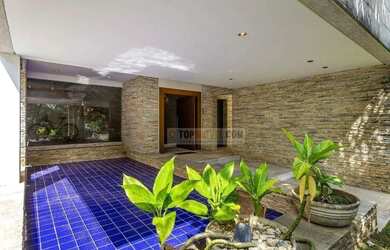 Imagem: A casa em condomínio possui 5 Dormitórios, 5 Banheiros, 4