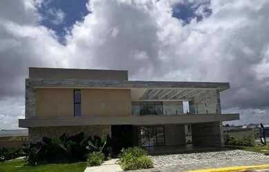 Imagem: A casa em condomínio possui 4 Dormitórios, 5 Banheiros, 3