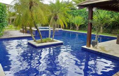 Imagem: A casa possui 5 Dormitórios, 5 Banheiros, 5 Vagas na garagem