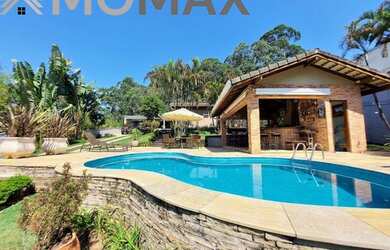 Imagem: A casa em condomínio possui 5 Dormitórios, 5 Banheiros, 5