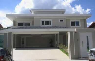 Imagem: A casa em condomínio possui 4 Dormitórios, 4 Banheiros, 5