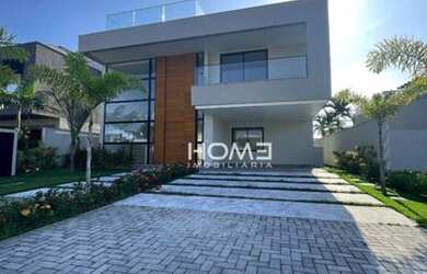 Imagem: A casa em condomínio possui 5 Dormitórios, 5 Banheiros, 2