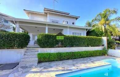 Imagem: A casa em condomínio possui 4 Dormitórios, 5 Banheiros, 4