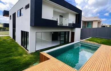 Imagem: A casa em condomínio possui 5 Dormitórios, 5 Banheiros, 4