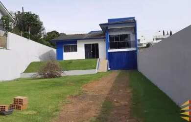 Imagem: A casa possui 3 Dormitórios, 3 Banheiros, 3 Vagas na garagem