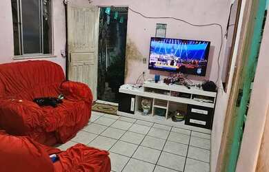 Imagem: A casa possui 2 Dormitórios e 1 Banheiro e está localizado