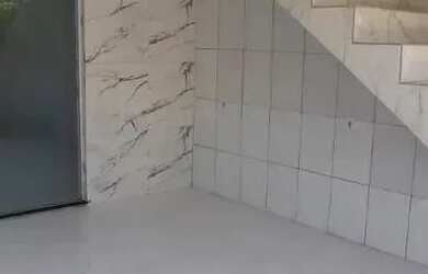 Imagem: A casa possui 2 Dormitórios, 3 Banheiros, 2 Vagas na garagem