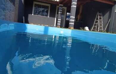 Imagem: A casa possui 2 Dormitórios, 2 Banheiros, 2 Vagas na garagem