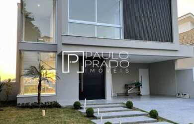 Imagem: A casa em condomínio possui 5 Dormitórios, 5 Banheiros, 4