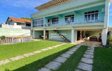 Imagem: A casa possui 4 Dormitórios, 3 Banheiros, 4 Vagas na garagem