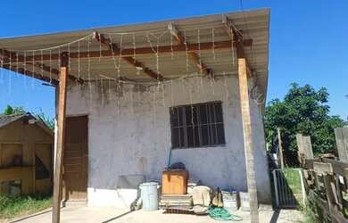 Imagem: A casa possui 5 Dormitórios, 2 Banheiros, 210m² de Área e