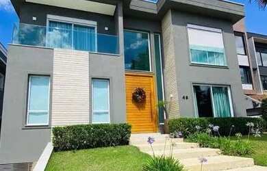 Imagem: A casa em condomínio possui 4 Dormitórios, 5 Banheiros, 5