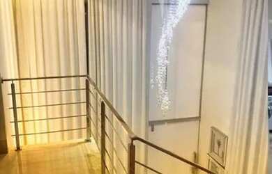 Imagem: A casa possui 3 Dormitórios, 4 Banheiros, 3 Vagas na garagem