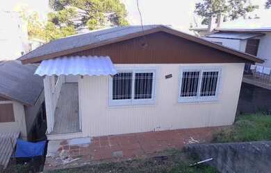 Imagem: A casa possui 3 Dormitórios, 1 Banheiro, 72m² de Área e