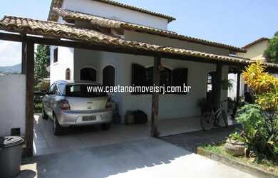 Imagem: A casa possui 4 Dormitórios, 3 Banheiros, 3 Vagas na garagem