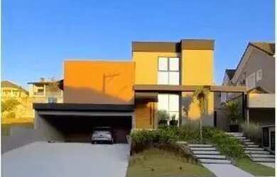 Imagem: A casa em condomínio possui 5 Dormitórios, 5 Banheiros, 5