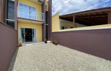 Imagem: A casa possui 2 Dormitórios, 2 Banheiros, 1 Vaga na garagem