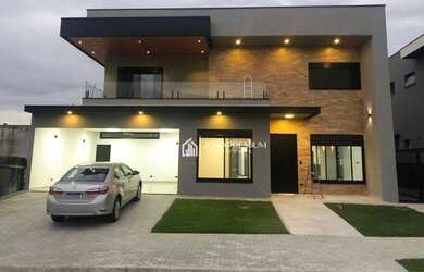 Imagem: A casa em condomínio possui 4 Dormitórios, 5 Banheiros, 4