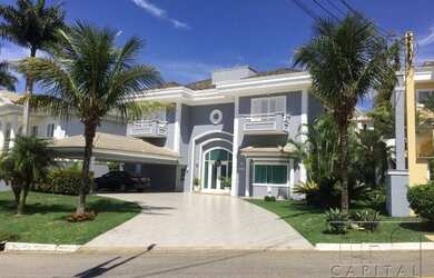 Imagem: A casa em condomínio possui 4 Dormitórios, 5 Banheiros, 4