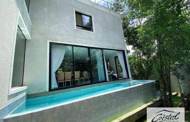 Imagem: A casa em condomínio possui 3 Dormitórios, 4 Banheiros, 5