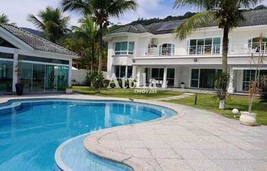 Imagem: A casa possui 5 Dormitórios, 5 Banheiros, 5 Vagas na garagem