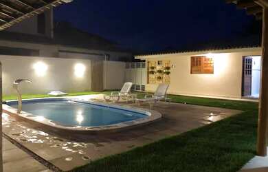 Imagem: A casa possui 4 Dormitórios, 4 Banheiros, 3 Vagas na garagem