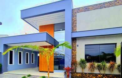 Imagem: A casa possui 3 Dormitórios, 2 Banheiros, 2 Vagas na garagem