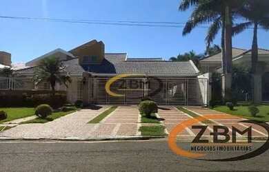 Imagem: A casa possui 5 Dormitórios, 5 Banheiros, 5 Vagas na garagem