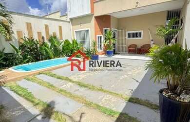 Imagem: A casa possui 3 Dormitórios, 3 Banheiros, 2 Vagas na garagem