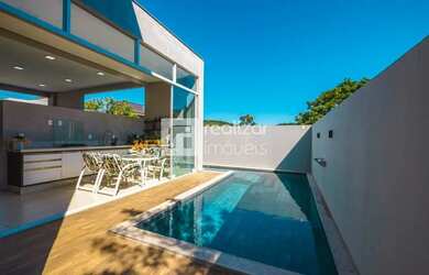 Imagem: A casa em condomínio possui 4 Dormitórios, 5 Banheiros, 4