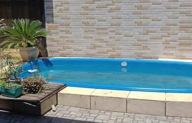 Imagem: A casa em condomínio possui 2 Dormitórios, 1 Banheiro, 2 Vagas