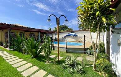 Imagem: A casa possui 5 Dormitórios, 5 Banheiros, 5 Vagas na garagem