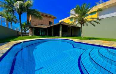 Imagem: A casa possui 3 Dormitórios, 4 Banheiros, 4 Vagas na garagem