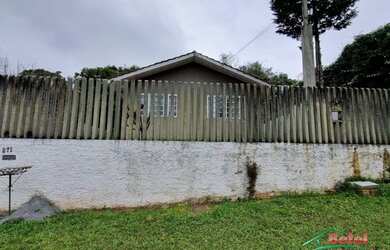 Imagem: A casa possui 3 Dormitórios, 2 Banheiros, 1 Vaga na garagem