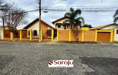 Imagem: A casa possui 2 Dormitórios, 5 Banheiros, 3 Vagas na garagem