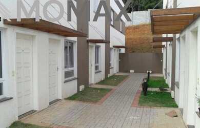 Imagem: A casa em condomínio possui 2 Dormitórios, 2 Banheiros, 1