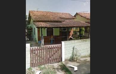 Imagem: A casa possui 3 Dormitórios, 3 Banheiros e 3 Vagas na garagem