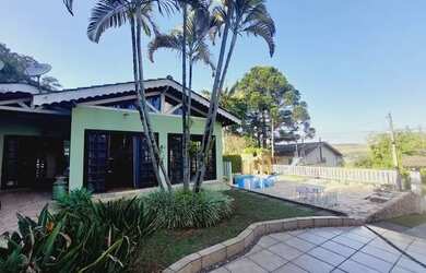 Imagem: A casa em condomínio possui 4 Dormitórios, 4 Banheiros, 4