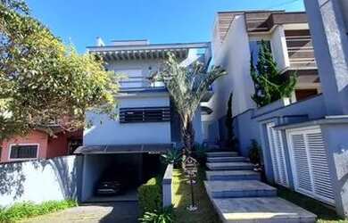 Imagem: A casa em condomínio possui 3 Dormitórios, 5 Banheiros, 5