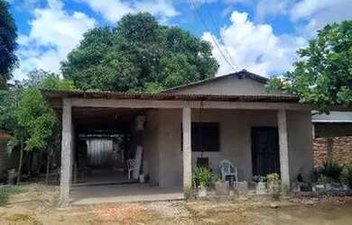 Imagem: A casa possui 2 Dormitórios, 1 Banheiro, 3 Vagas na garagem