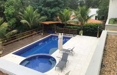 Imagem: A casa em condomínio possui 5 Dormitórios, 5 Banheiros, 5