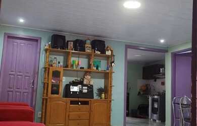 Imagem: A casa possui 2 Dormitórios e 2 Banheiros e está localizado