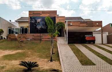 Imagem: A casa possui 3 Dormitórios, 5 Banheiros, 5 Vagas na garagem