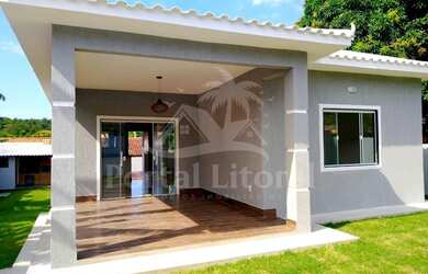 Imagem: A casa possui 3 Dormitórios, 3 Banheiros, 4 Vagas na garagem