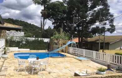 Imagem: A casa em condomínio possui 4 Dormitórios, 5 Banheiros, 4