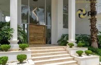 Imagem: A casa possui 5 Dormitórios, 5 Banheiros, 5 Vagas na garagem