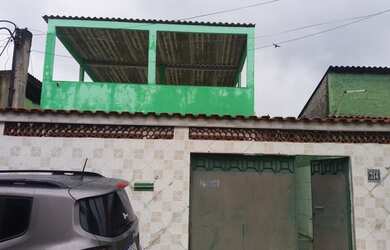 Imagem: A casa possui 2 Dormitórios, 1 Banheiro, 1 Vaga na garagem